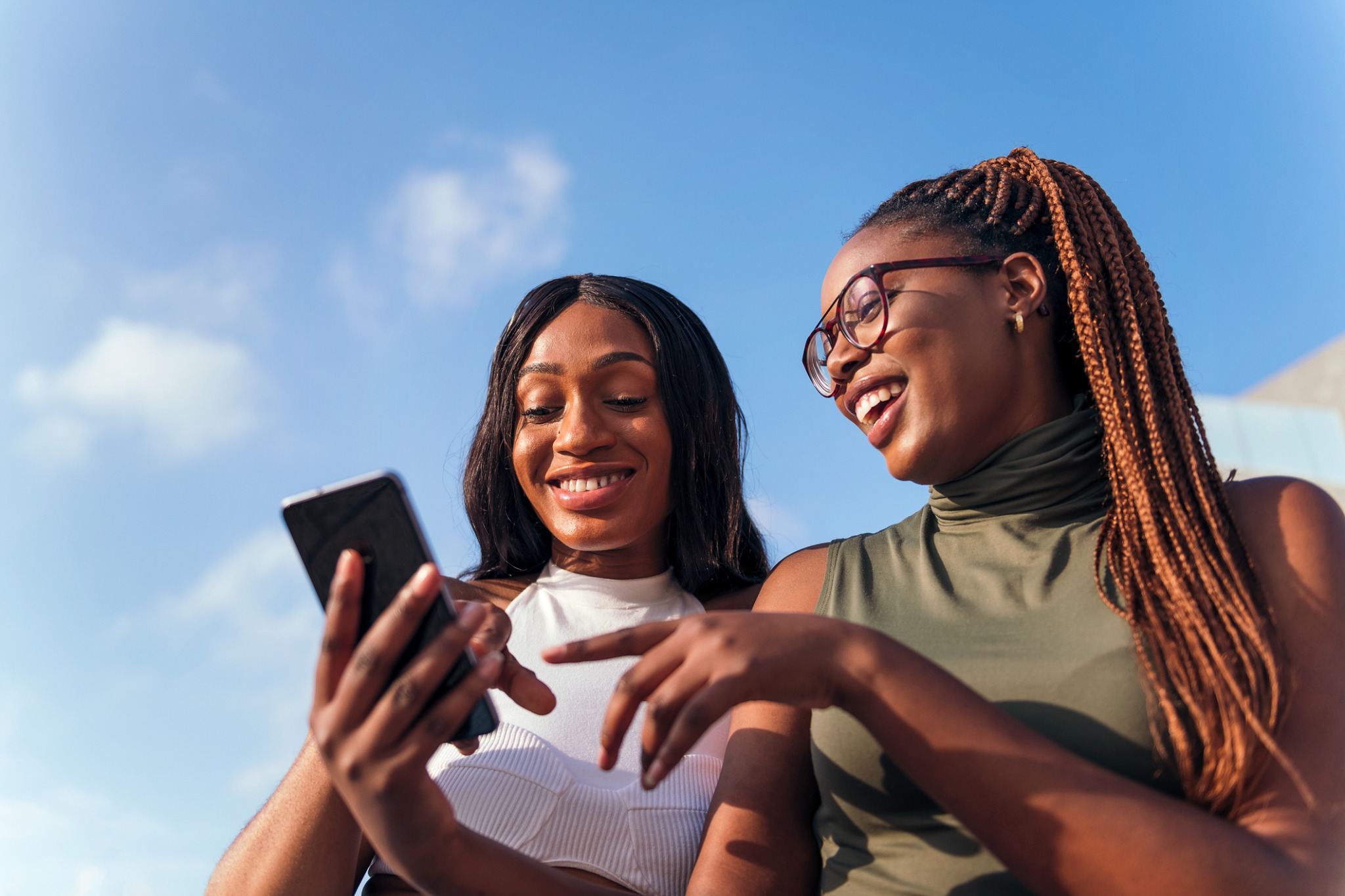 Two friends connecting outdoors