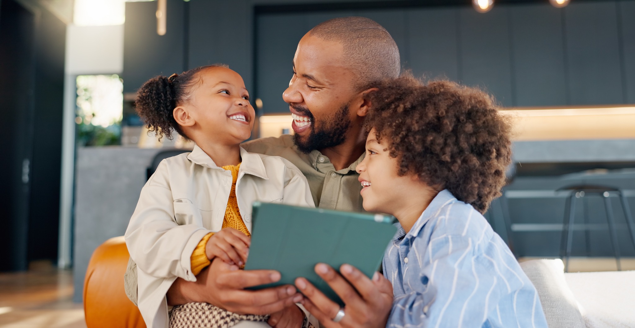 A father sharing time with his children